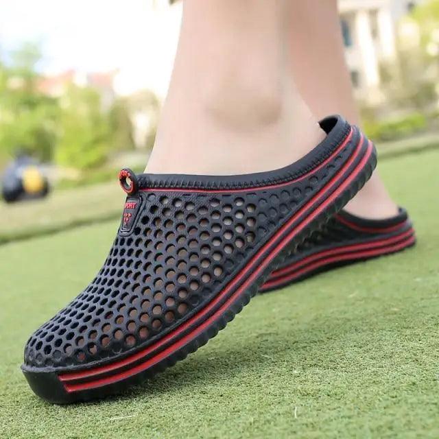 Stevvex black mesh closed-toe sandals with perforated holes and red-striped sole clog style on Tampa Home & Garden Store
