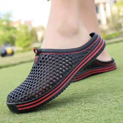 Stevvex black mesh closed-toe sandals with perforated holes and red-striped sole clog style on Tampa Home & Garden Store