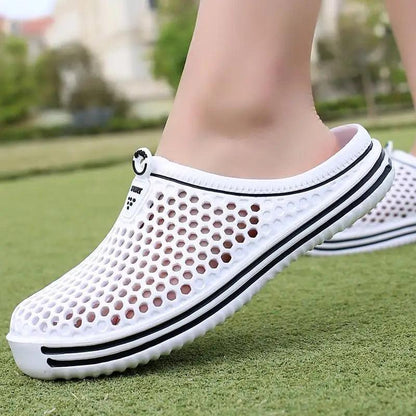 Stevvex white perforated closed-toe slip-on sandals with black striped sole unisex on Tampa Home & Garden Store