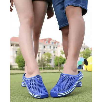 Blue Stevvex perforated mesh slip-on sandals for unisex casual garden wear, pair on Tampa Home & Garden Store