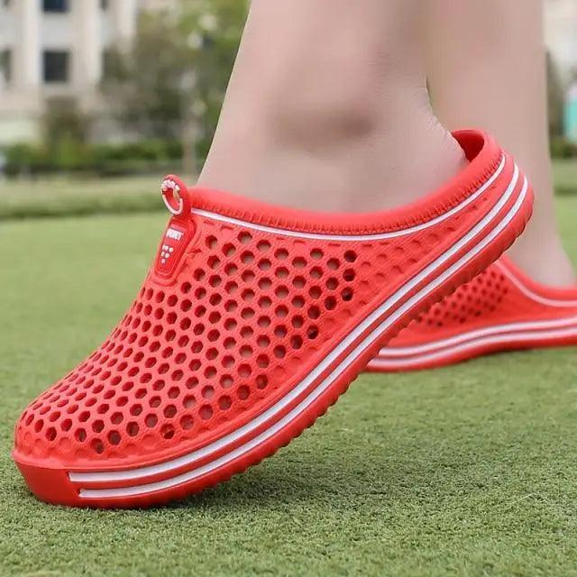 Sandals Stevvex red perforated mesh pair with white striped sole on Tampa Home & Garden Store