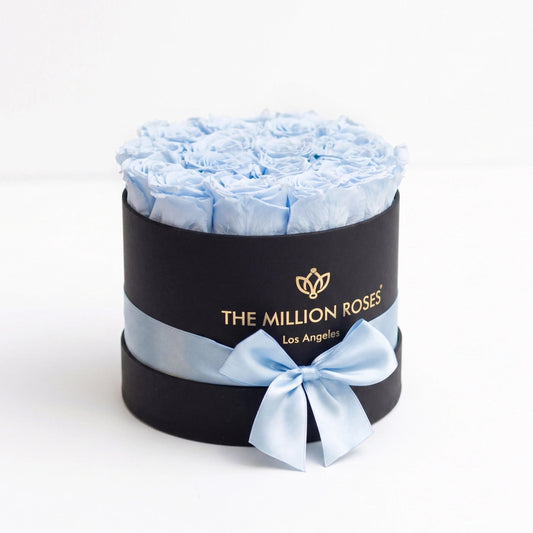 Classic black box with light blue roses and satin blue ribbon by The Million Roses on Tampa Home & Garden Store