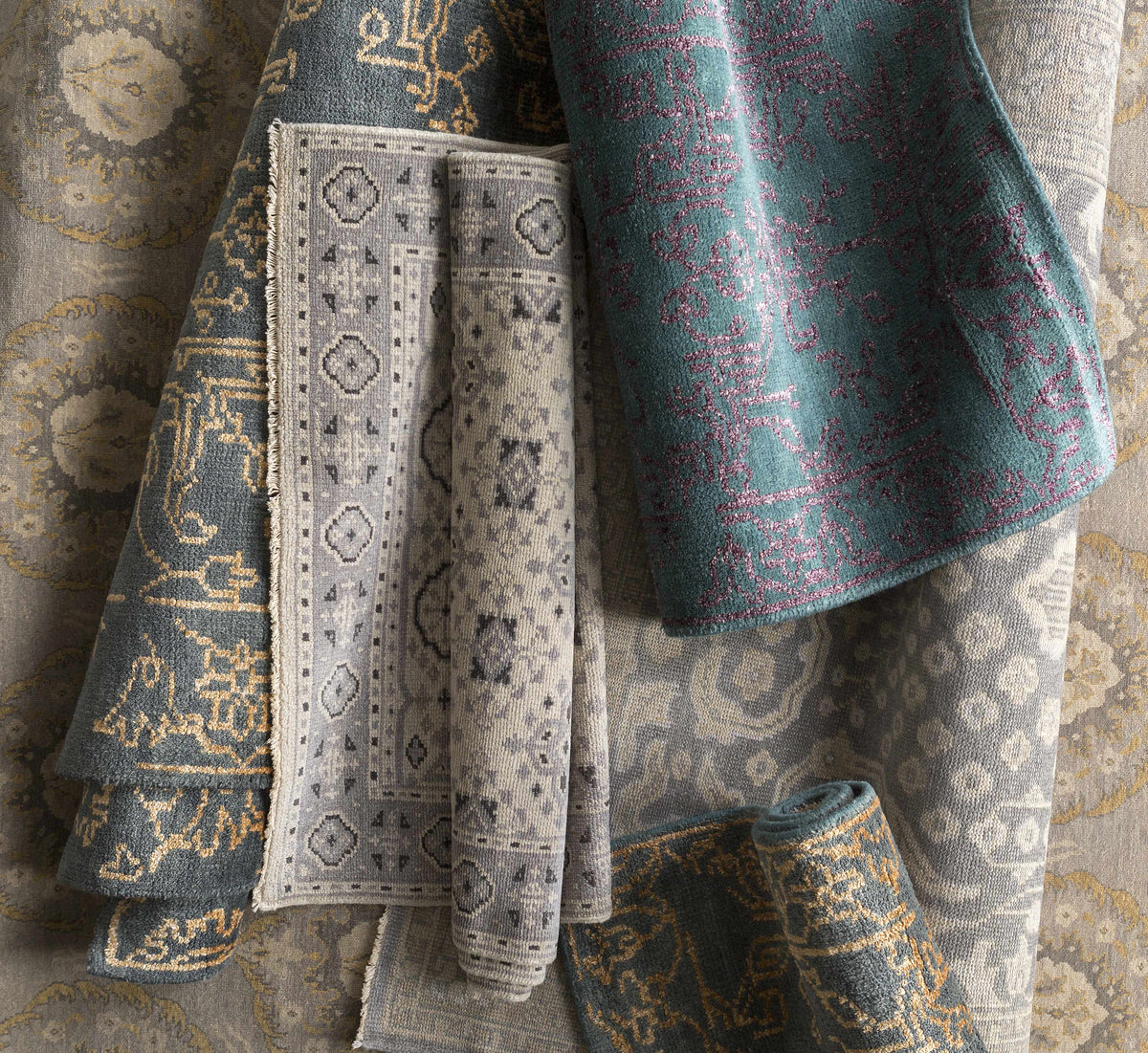 Bradfordsville Premium Rug teal and gray ornate pattern rolled rugs on display on Tampa Home & Garden Store