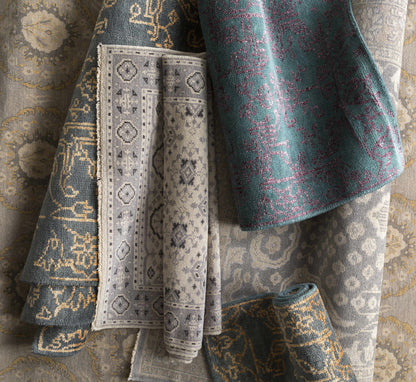 Haleiwa Clearance Rug by Boutique Rugs in teal and gray with gold motifs on Tampa Home & Garden Store