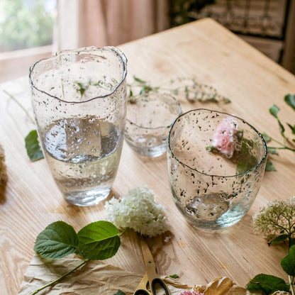 Clear art glass vase trio by RusticReach with speckled finish and wavy rims on a wood table on Tampa Home & Garden Store