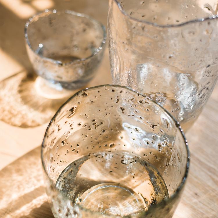 Clear art glass vase by RusticReach with bubble-textured surface; glassware on wood on Tampa Home & Garden Store