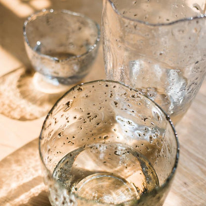 Clear art glass vase by RusticReach with bubble-textured surface; glassware on wood on Tampa Home & Garden Store