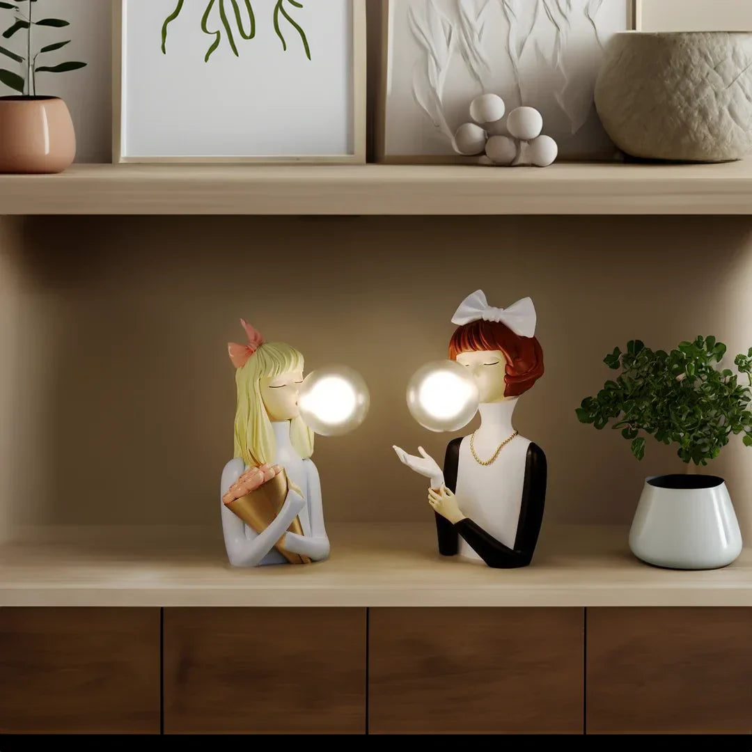 Parisian Bubble Girls Moktan Sabai clear glass LED table lamps pair with ceramic figurines on Tampa Home & Garden Store