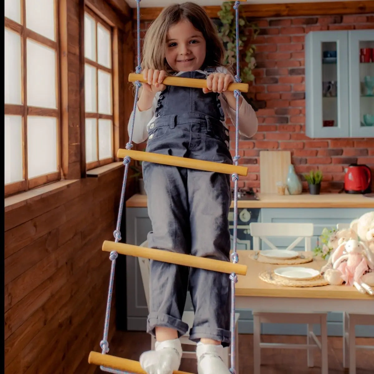 Climbing rope ladder swing for kids with natural wood rungs and blue ropes on Tampa Home & Garden Store