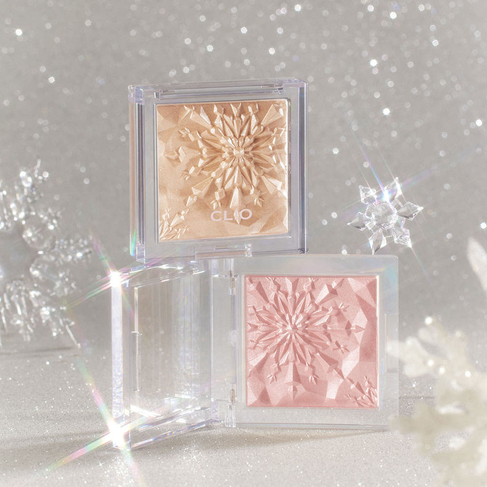 CLIO Prism Highlighter 8g Seoulia, dual clear compacts with gold beige and pink powders, starburst embossing on Tampa Home & Garden Store