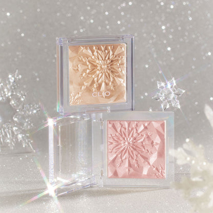 CLIO Prism Highlighter 8g Seoulia, dual clear compacts with gold beige and pink powders, starburst embossing on Tampa Home & Garden Store
