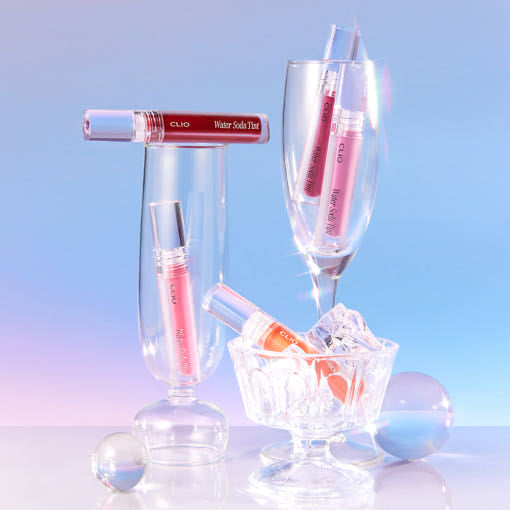CLIO Water Soda Tint lip tint set by Seoulia in 5 pink-orange shades displayed in glassware on Tampa Home & Garden Store