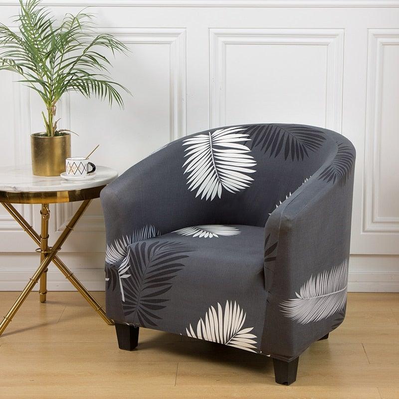 Stevvex club chair slipcover in dark gray with white palm leaf print; elastic spandex cover on Tampa Home & Garden Store