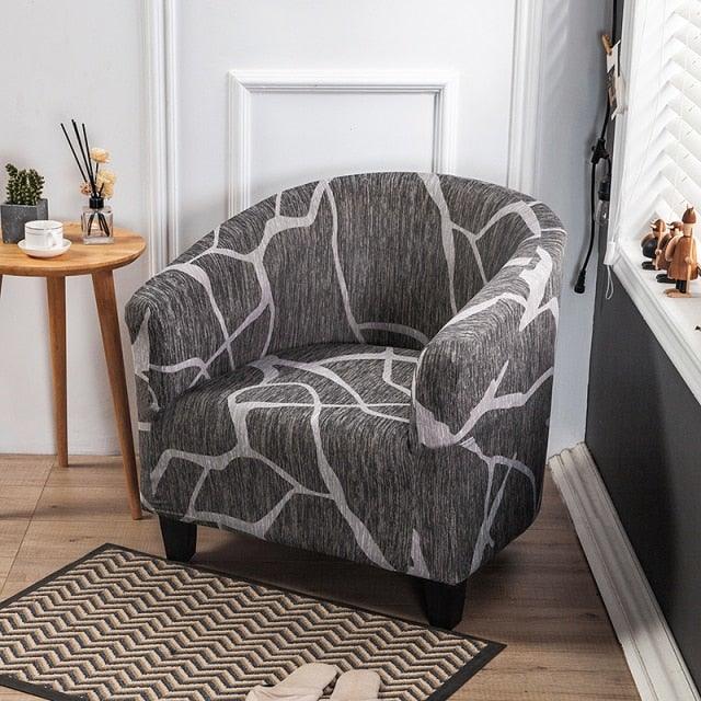 Club chair slipcover in gray geometric print; Stevvex spandex elastic fabric on Tampa Home & Garden Store