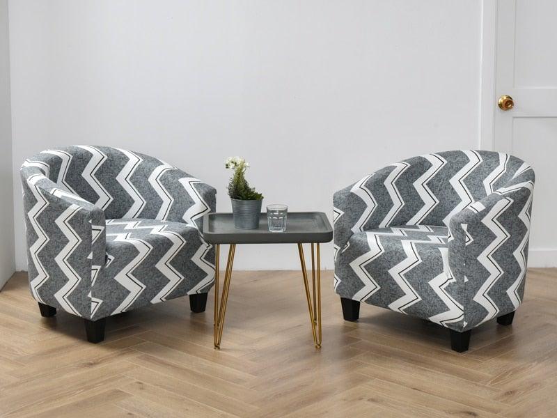 Stevvex geometric zigzag club chair slipcovers on two gray armchairs with a small coffee table on Tampa Home & Garden Store