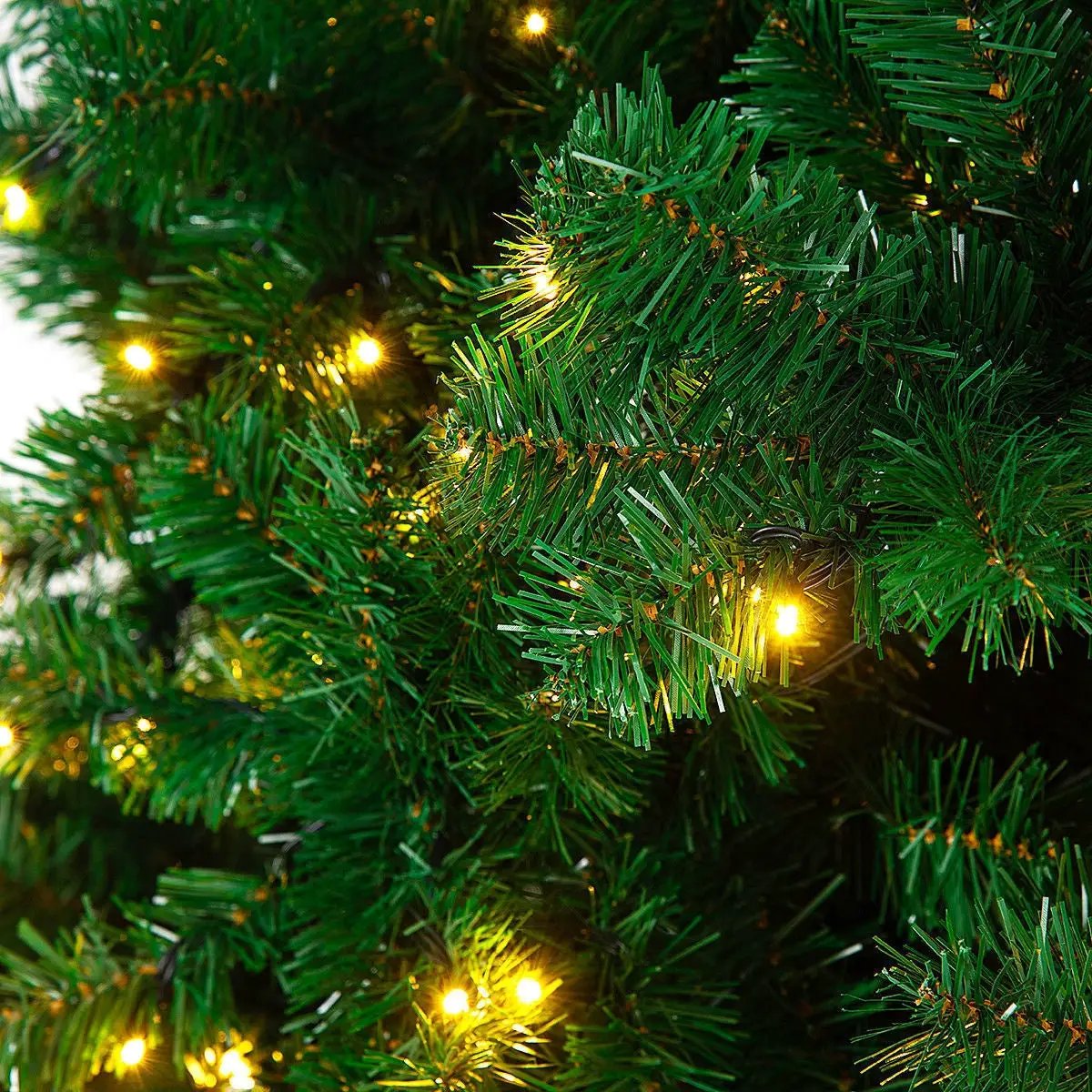 9 ft PVC artificial Christmas tree with 700 warm LED lights on Tampa Home & Garden Store