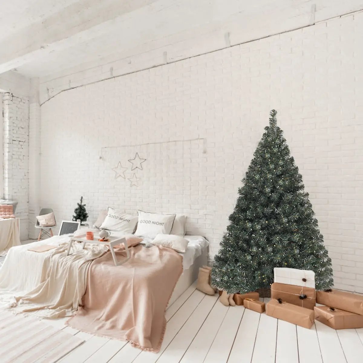 4.5 ft PVC pre-lit DirectDeals hinged Christmas tree with warm lights in a bright white bedroom on Tampa Home & Garden Store