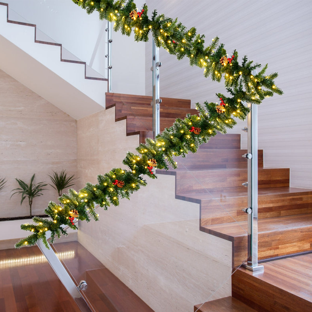 9 Feet Pre-lit Artificial Christmas Garland Red Berries with LED DirectDeals on staircase railing on Tampa Home & Garden Store