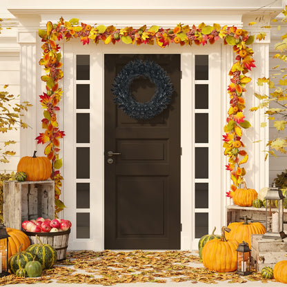 24-inch black Halloween wreath on front door with autumn garland and pumpkins on Tampa Home & Garden Store
