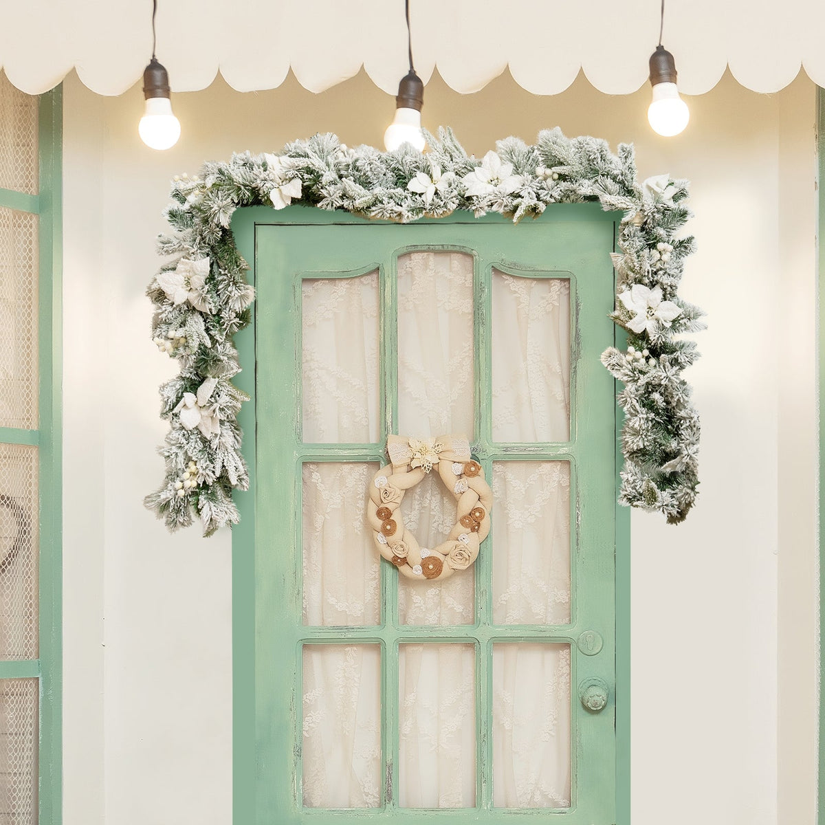 9 Feet Pre-Lit Artificial Christmas Garland with 50 LED Lights frosted pine around green door on Tampa Home & Garden Store