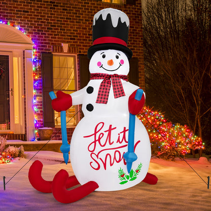 Inflatable snowman with plaid scarf, black top hat, blue arms, LED lights, built-in sandbag on Tampa Home & Garden Store