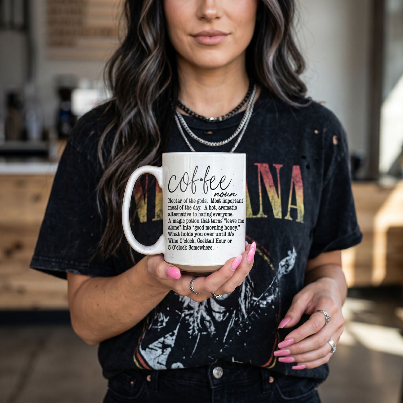 Coffee Def 16oz mug with definition text, white ceramic held by a woman in a black tee on Tampa Home & Garden Store