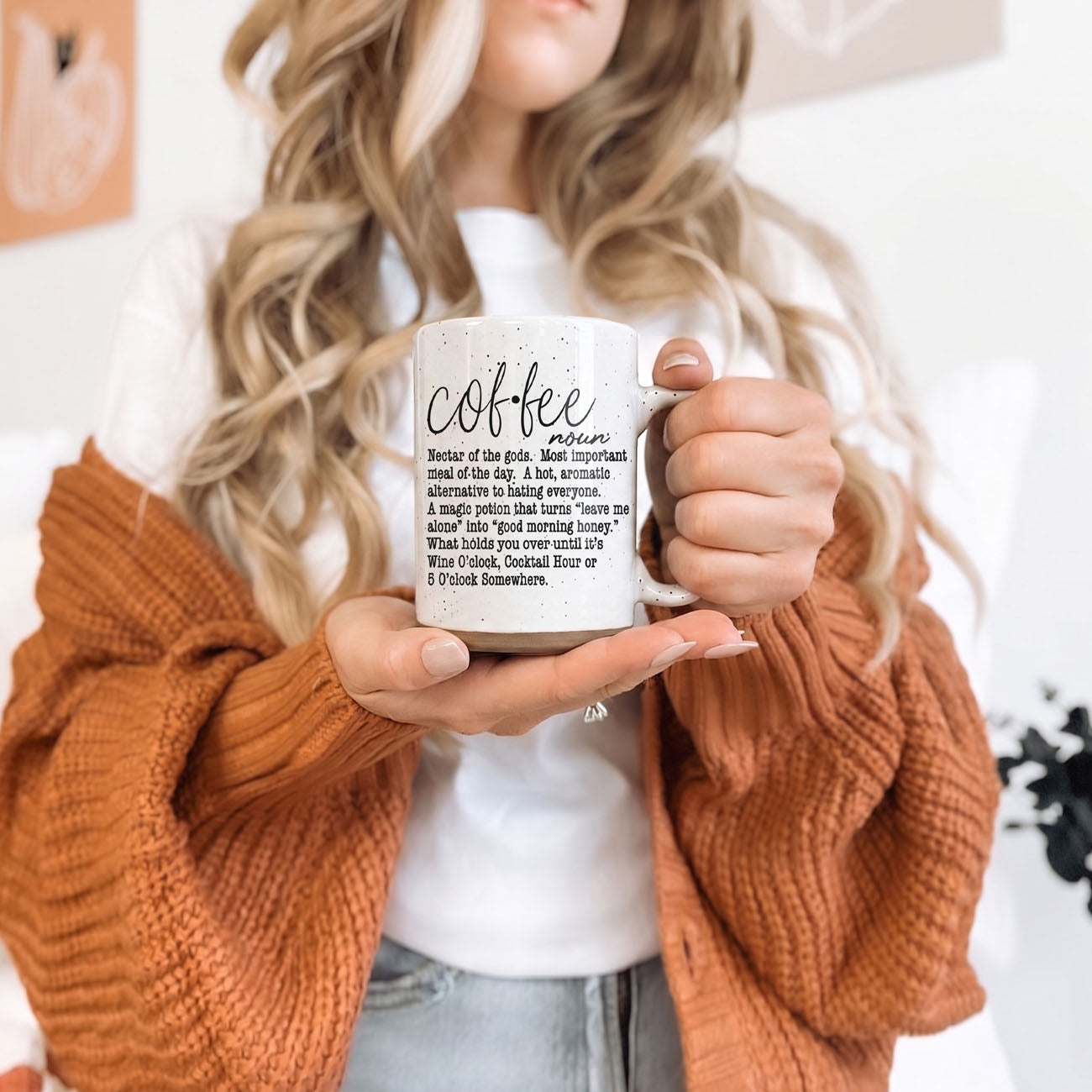 Coffee Def 16oz mug by Gia Roma, speckled ceramic with black coffee text, held in hand on Tampa Home & Garden Store