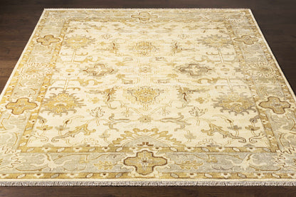 Colebrook Carpet rug by Boutique Rugs in cream with gold-gray ornate motifs and bordered edges on Tampa Home & Garden Store