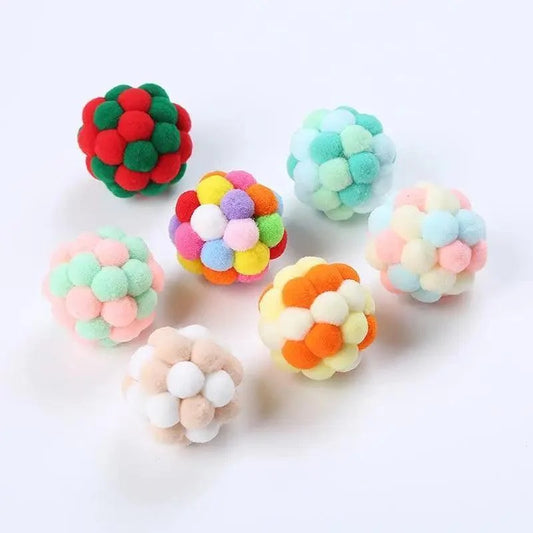 Colorful handmade cat ball toy set of 7 fluffy pom-poms in assorted colors by Stevvex on Tampa Home & Garden Store
