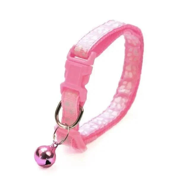 Stevvex pink nylon adjustable pet collar with footprint print and pink bell on Tampa Home & Garden Store