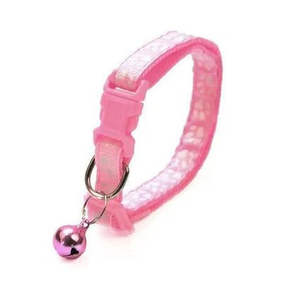 Stevvex pink nylon adjustable pet collar with footprint print and pink bell on Tampa Home & Garden Store