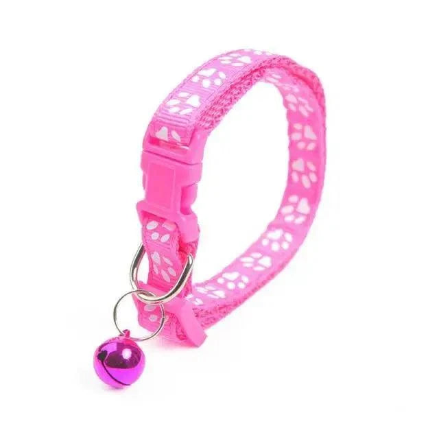 Pink nylon pet collar with paw-print pattern, adjustable Stevvex collar with bell on Tampa Home & Garden Store
