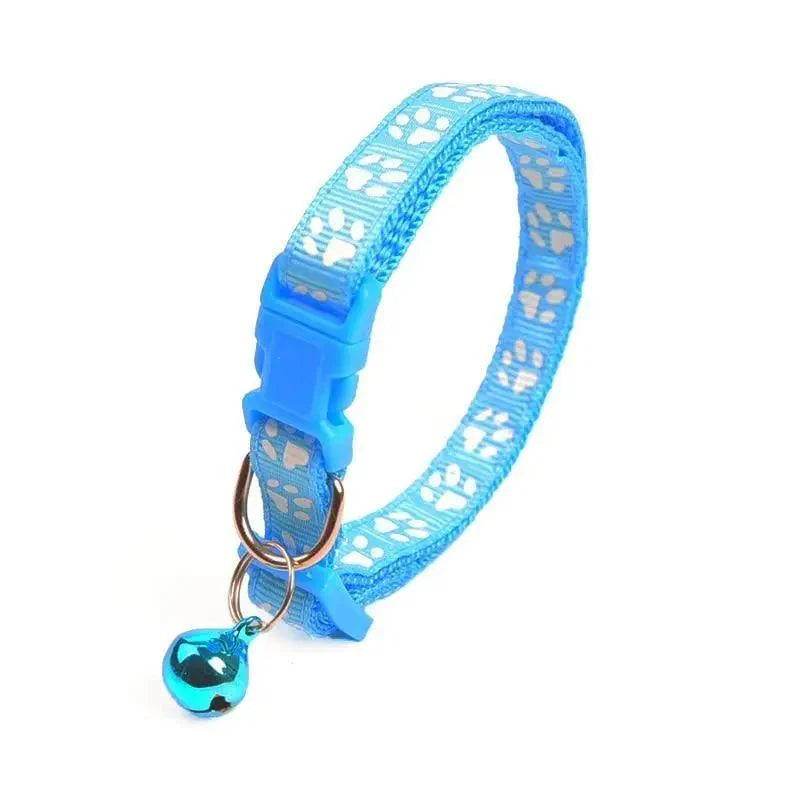 Stevvex blue nylon dog collar with footprint pattern, adjustable buckle and blue bell on Tampa Home & Garden Store