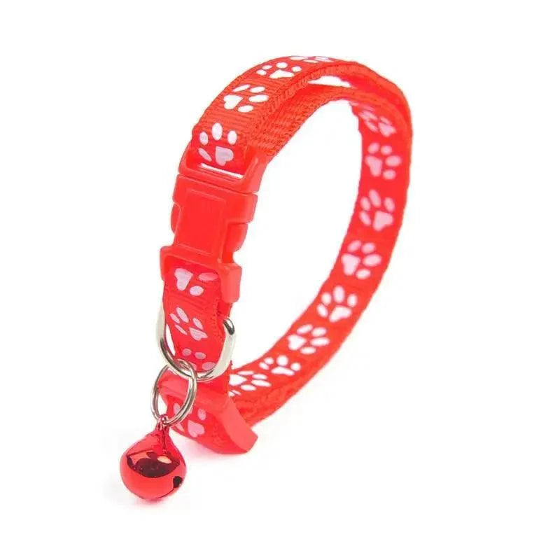 Stevvex red nylon dog collar with white paw prints and bell on Tampa Home & Garden Store