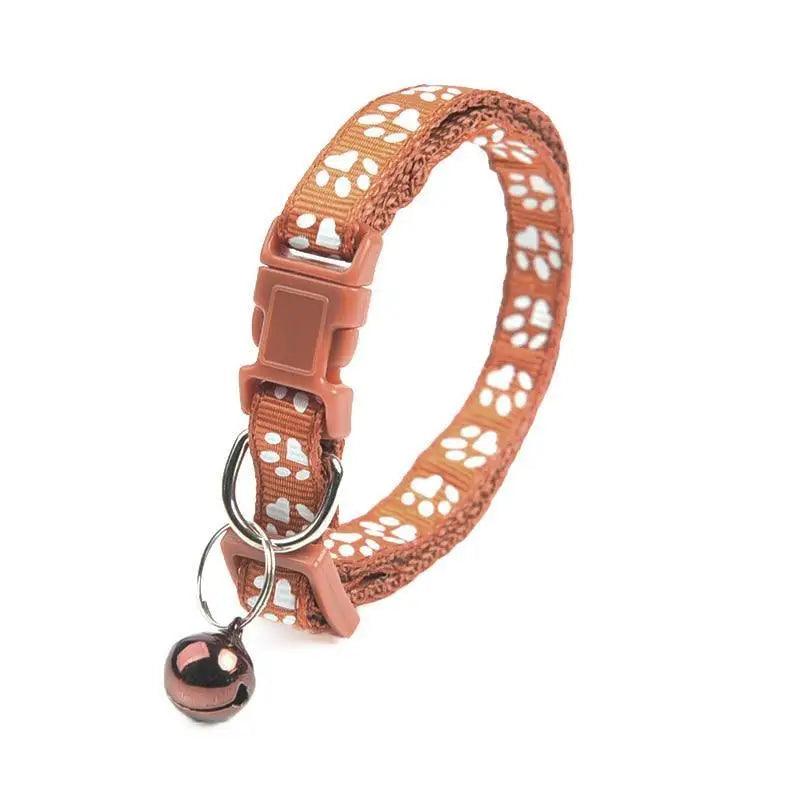 Stevvex colorful nylon adjustable dog collar with white paw-print pattern and bell on Tampa Home & Garden Store