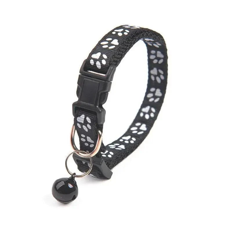 Stevvex nylon pet collar with paw print design, black adjustable strap and small bell on Tampa Home & Garden Store