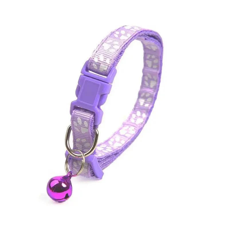 Stevvex purple nylon adjustable pet collar with paw print pattern and purple bell on metal ring on Tampa Home & Garden Store