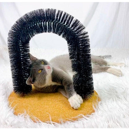 Stevvex arch cat massager with bristle brush on fleece base cat lounging under grooming toy on Tampa Home & Garden Store