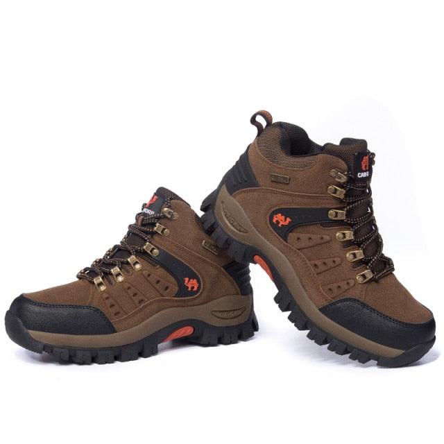 Stevvex men's brown waterproof hiking boots with rugged outsole and orange accents, pair on Tampa Home & Garden Store