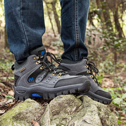 Stevvex men's waterproof hiking boots, gray/black ankle-high with rugged lug outsole on trail on Tampa Home & Garden Store