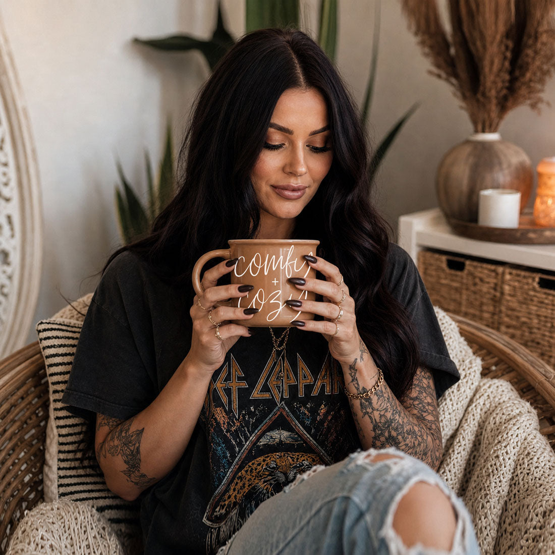 Comfy + Cozy ceramic coffee mug by Gia Roma in terracotta, held by a woman with dark hair on Tampa Home & Garden Store