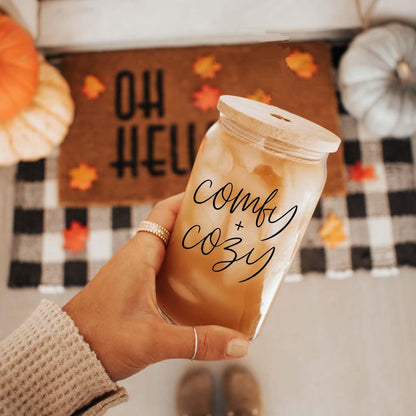 Comfy Cozy 17oz travel mug glass tumbler with wooden lid holding iced coffee amid fall decor on Tampa Home & Garden Store
