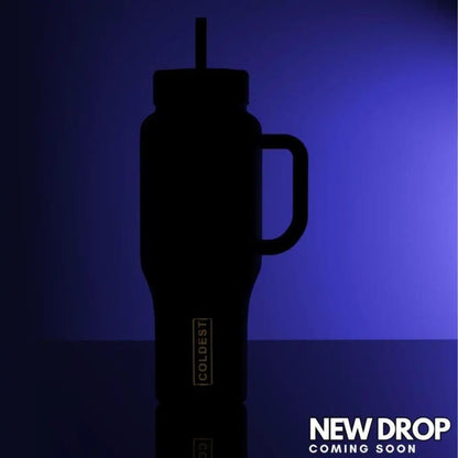 Coldest 36oz water bottle with black body and side handle silhouette on purple gradient on Tampa Home & Garden Store
