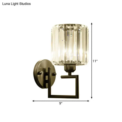 Black brass crystal sconce with a faceted glass shade and square arm, Decorbites wall light on Tampa Home & Garden Store
