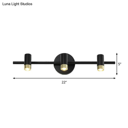 Black brass vanity sconce with three cylindrical lights on a 22in bar, Decorbites on Tampa Home & Garden Store