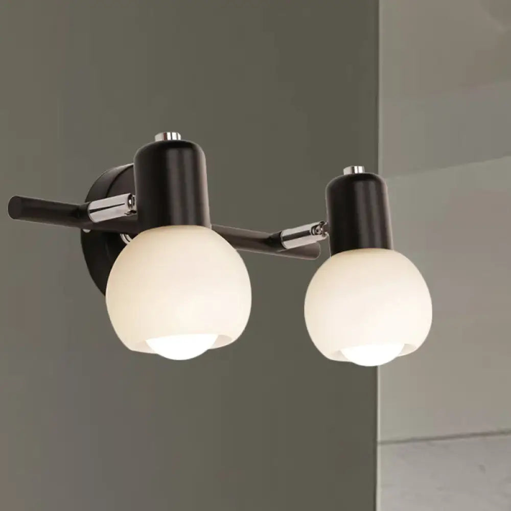 Black chrome globe sconce, two-light wall fixture with frosted glass globes by Decorbites on Tampa Home & Garden Store