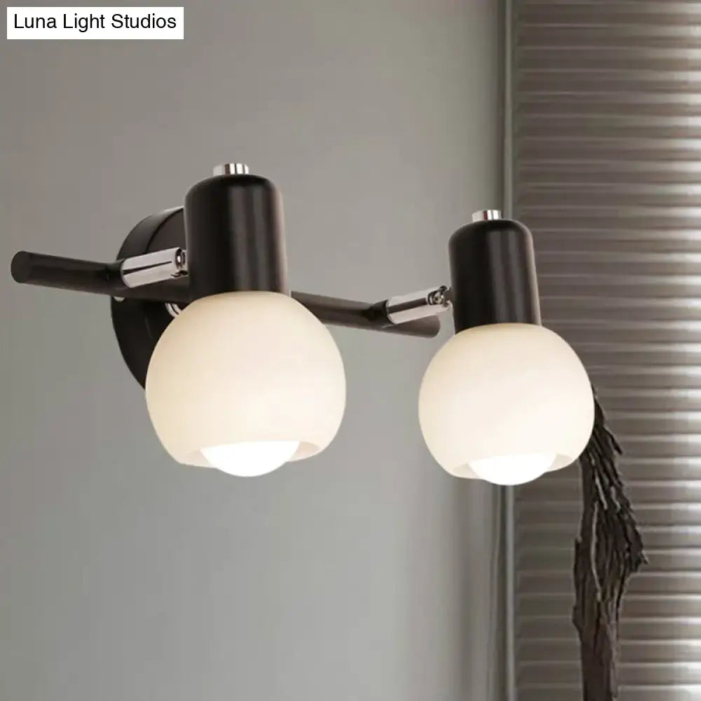 Black Chrome Globe Sconce with twin white glass globes on a black bar Decorbites on Tampa Home & Garden Store