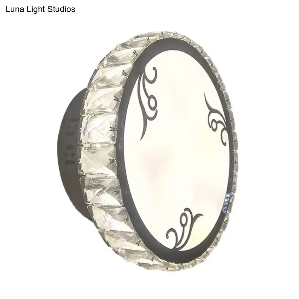 Black Circular Crystal Sconce with faceted crystal rim and decorative black swirls, Decorbites on Tampa Home & Garden Store