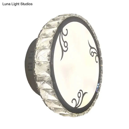 Black Circular Crystal Sconce with faceted crystal rim and decorative black swirls, Decorbites on Tampa Home & Garden Store