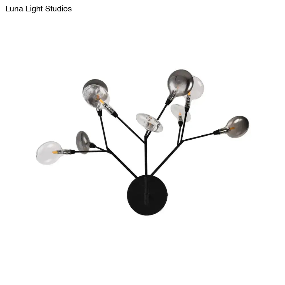 Black branching wall lamp by Decorbites with multiple arms and Edison bulbs on Tampa Home & Garden Store